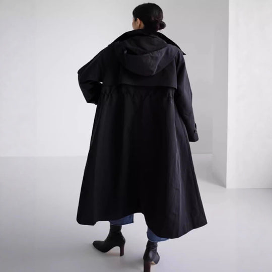 Damen Oversize-Longregenmantel mit Kapuze, wasserabweisendem GewShop Norye und weitem A-Linien-Schnitt Shop Nory