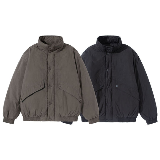 Unisex Kurz geschnittene gesteppte Boxy‑Blousonjacke mit hohem Stehkragen und Utility‑Flaptaschen Shop Nory