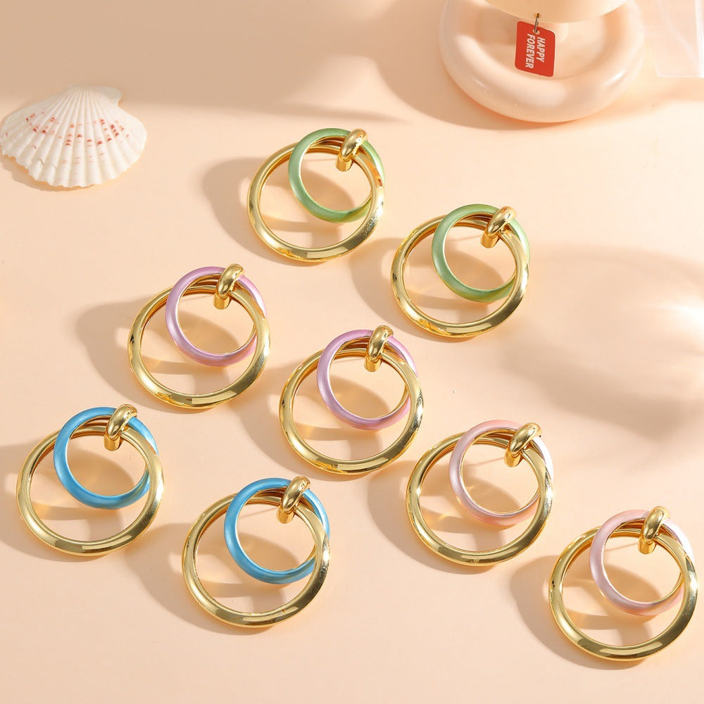 Damen Ohrringe mit elegantem, überlagertem Ringdesign Shop Nory