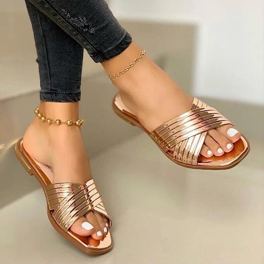 Damen Geflochtene Metallic-Slipper mit überkreuzten Riemen und flacher Komfortsohle Shop Nory