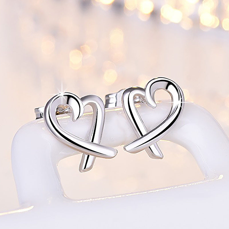 Damen Ohrstecker im herzförmigen Design mit elegantem Zirkonia-Besatz Shop Nory