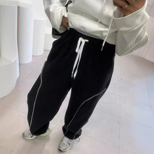 Damen Weite Sweatpants mit kontrastierenden Nahtdetails und Kordelzug Shop Nory