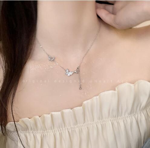 Damen Halskette mit filigranen Schmetterlingsanhängern und hochwertiger Verarbeitung Shop Nory