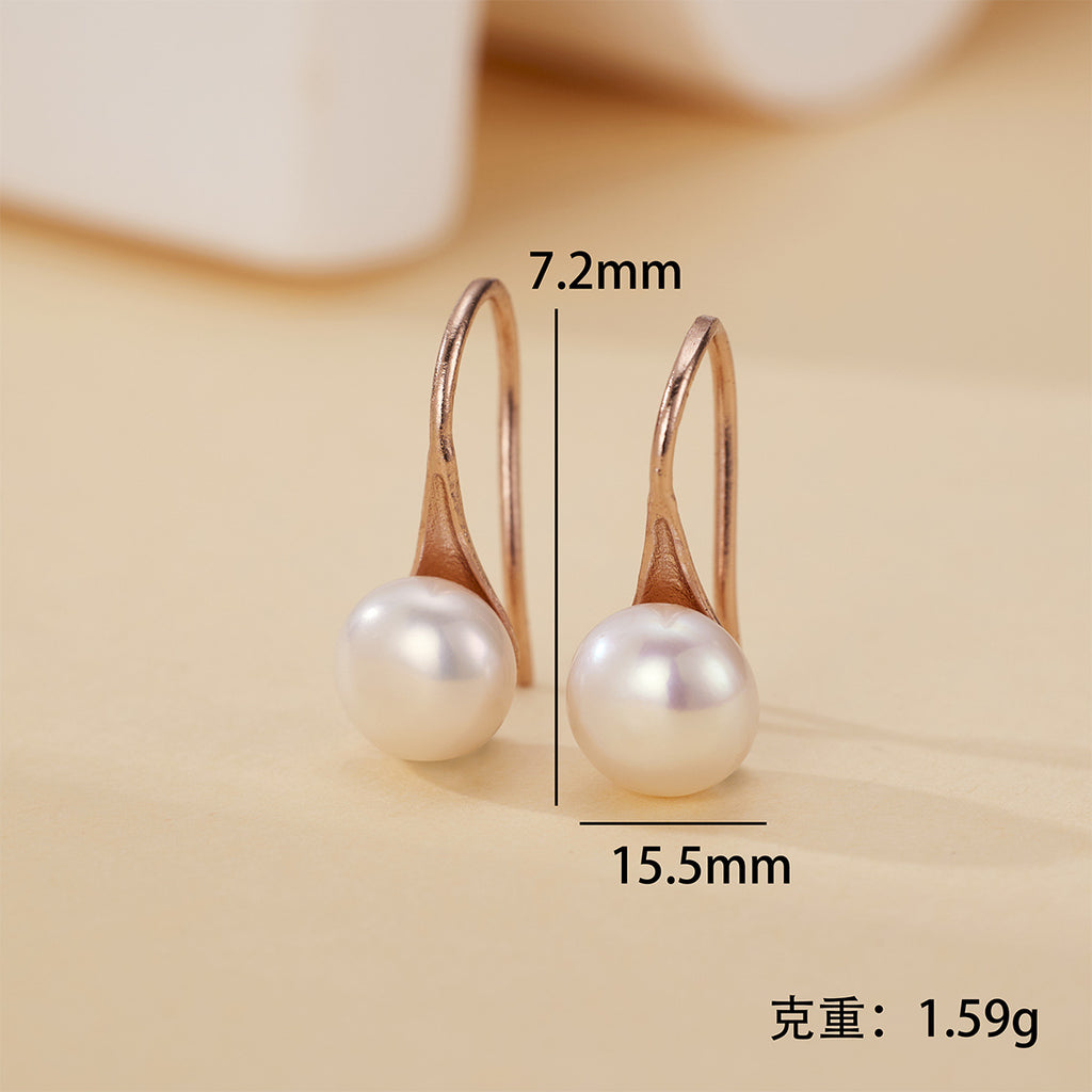 Damen elegante Ohrringe mit geschwungenem Design und echten Süßwasserperlen Shop Nory