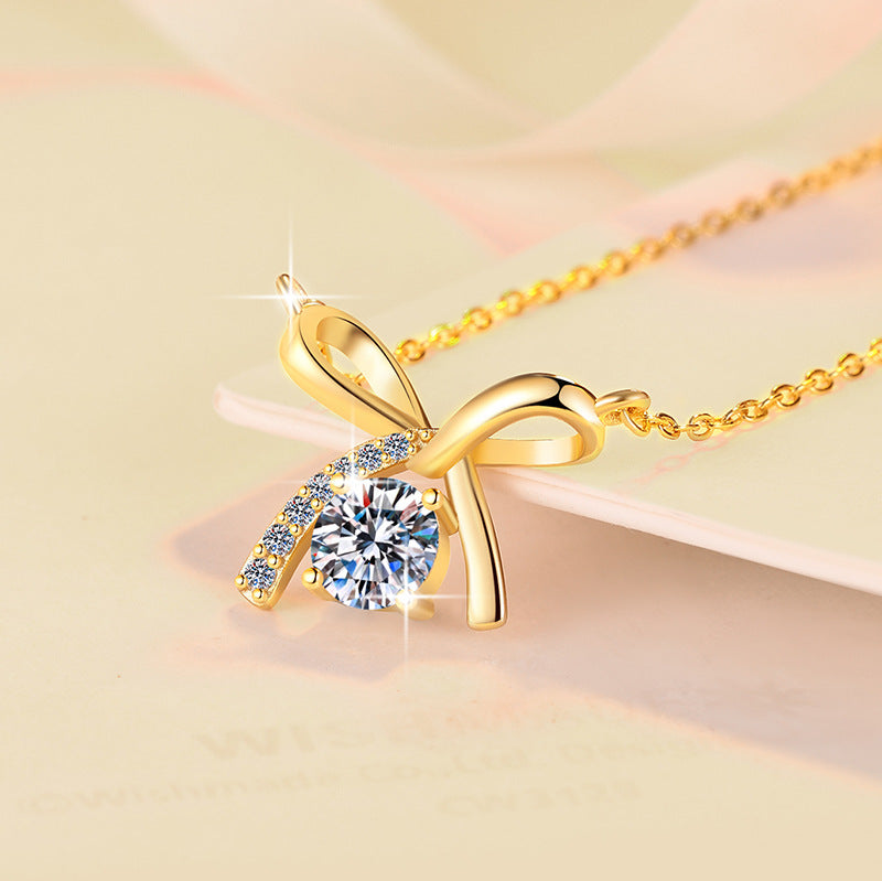 Damen Halskette mit elegantem Schleifenanhänger und hochwertigem Zirkonia-Besatz Shop Nory