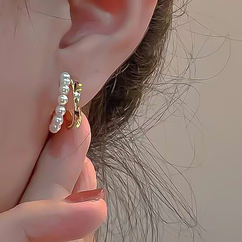 Damen-Ohrstecker mit elegantem Perlen-Design und geschwungenem Metallrahmen Shop Nory