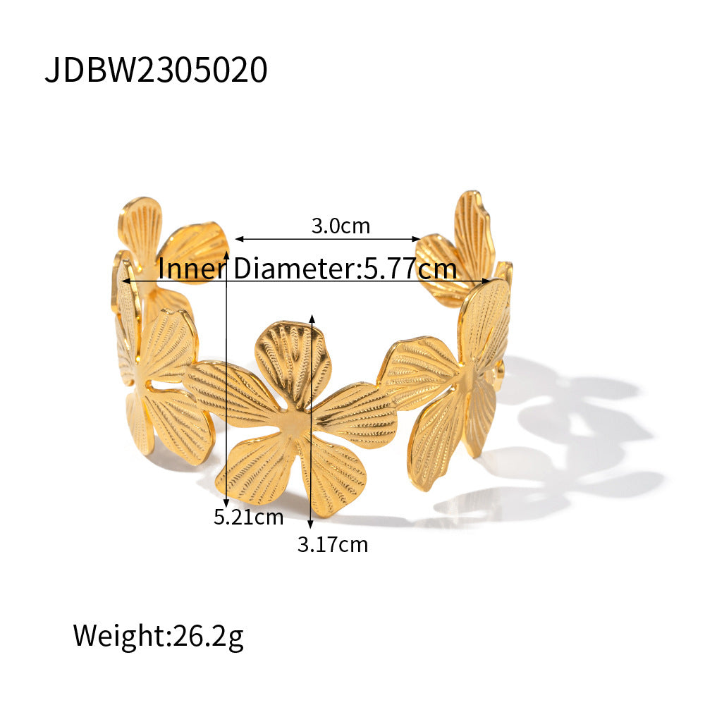 Damen Offenes Armreif mit floralem Design aus hochwertigem Edelstahl Shop Nory