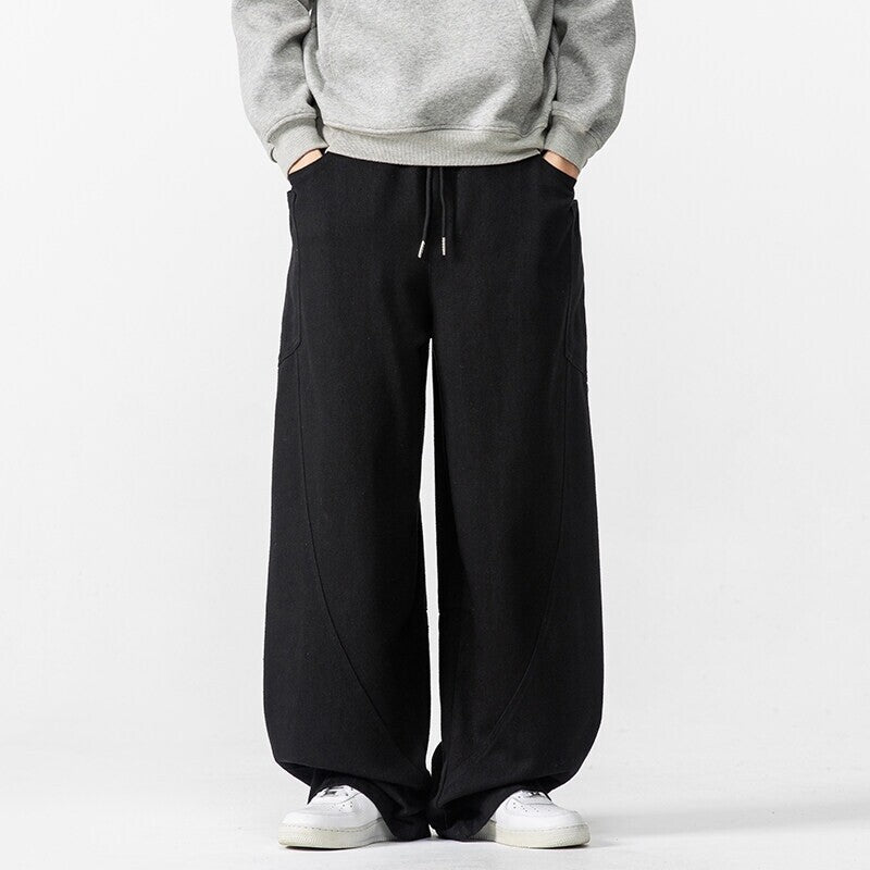 Herren Weite Loungehose mit Tunnelzug, aufgesetzten Taschen und markanten Panelnähten Shop Nory