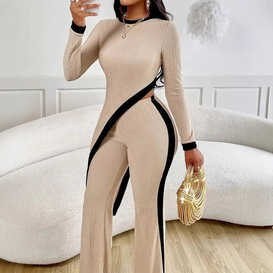Damen nan eleganter Rippen-Jumpsuit mit asymmetrischer Wickeloptik, taillierendem Cut-Out und kontrastierenden Seitenstreifen Shop Nory
