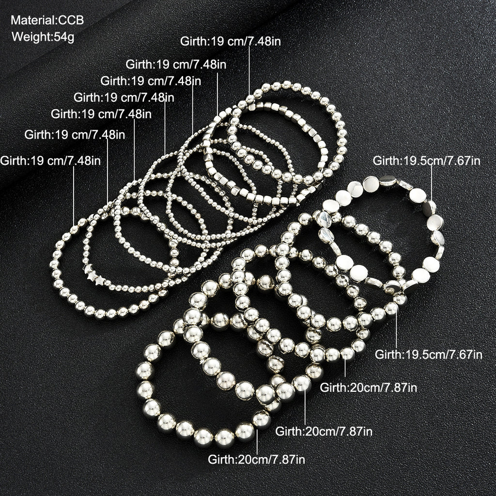 Damen Armreif-Set mit funkelnden metallischen Akzenten Shop Nory