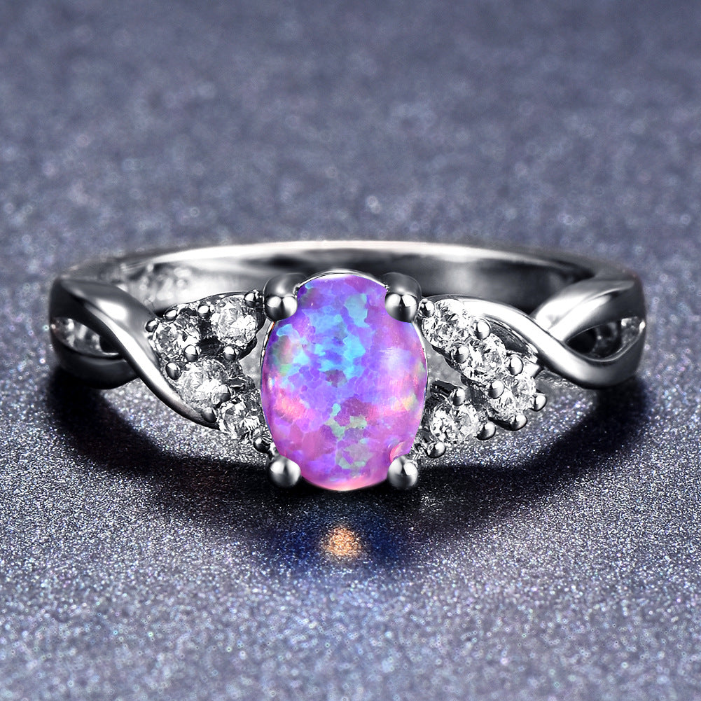 Damen Ring mit schimmerndem Opal und Zirkonia-Verzierungen Shop Nory