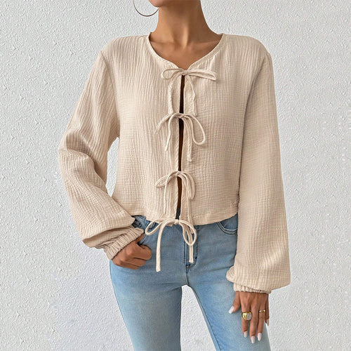 Damen kurz geschnittene Musselinbluse mit Knotenverschlüssen und Ballonärmeln Shop Nory