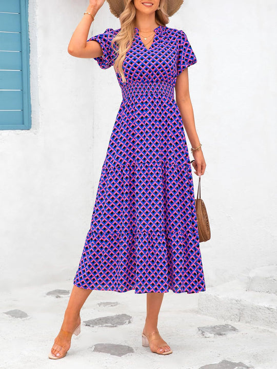 Damen Maxi-Kleid mit floralen Mustern und rüschendem Saum Shopnory