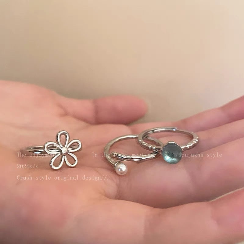 Damen Ring-Set mit filigranen Blütenmotiven und elegantem Edelsteindetail Shop Nory