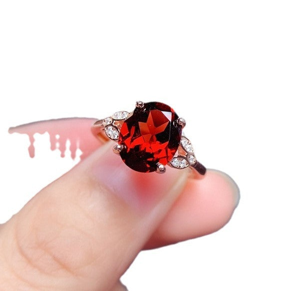 Damen Eleganter Ring mit ovalem Stein und funkelnden Akzenten Shop Nory