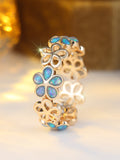Damen Ring mit floralen, leuchtenden Opaleinsätzen Shop Nory