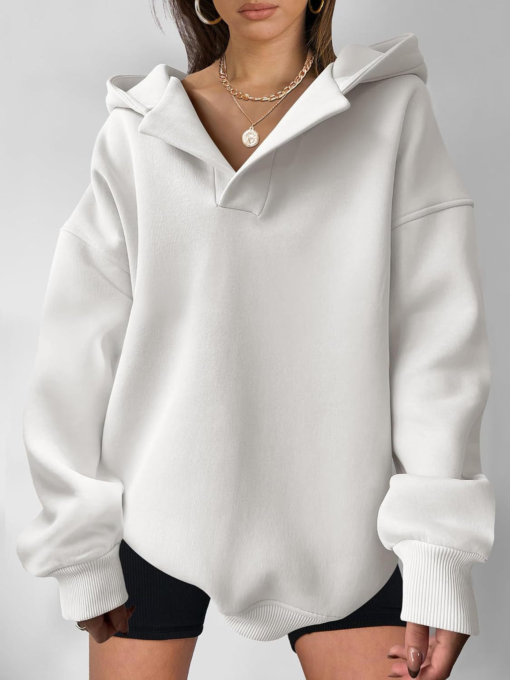 Damen Kapuzensweater mit übergroßem Schnitt und V-Ausschnitt