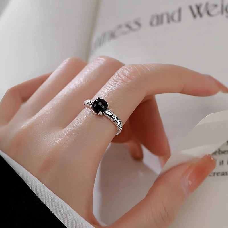 Damen filigraner Ring mit elegantem Onyx und kunstvoller Fassung Shop Nory