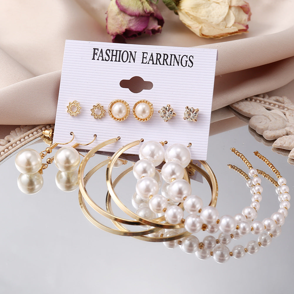 Damen Ohrringe Set mit eleganten herzförmigen Anhängern und funkelnden Kristallen Shop Nory