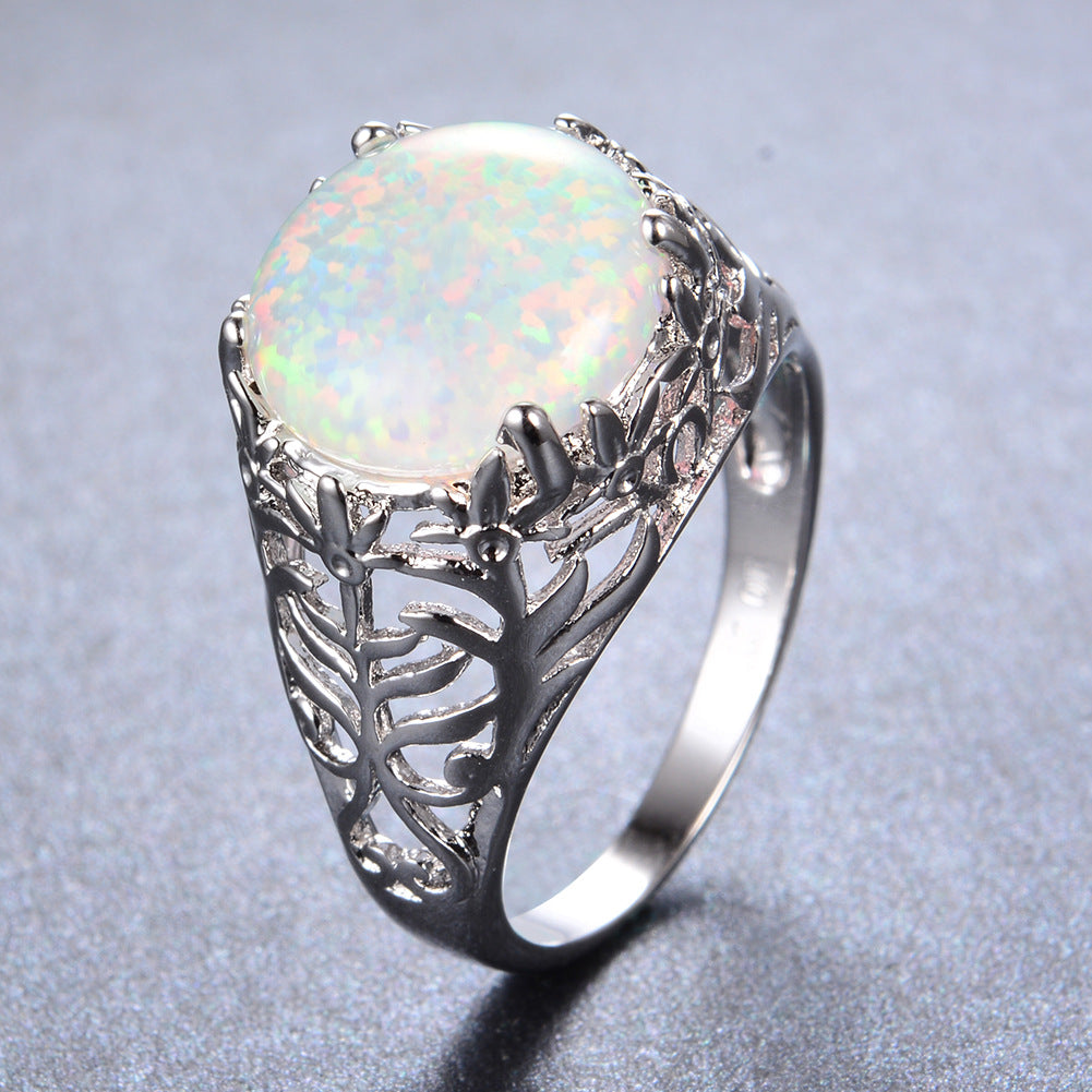 Damen Ring mit kunstvollem Blattdesign und schimmerndem Opal Shop Nory