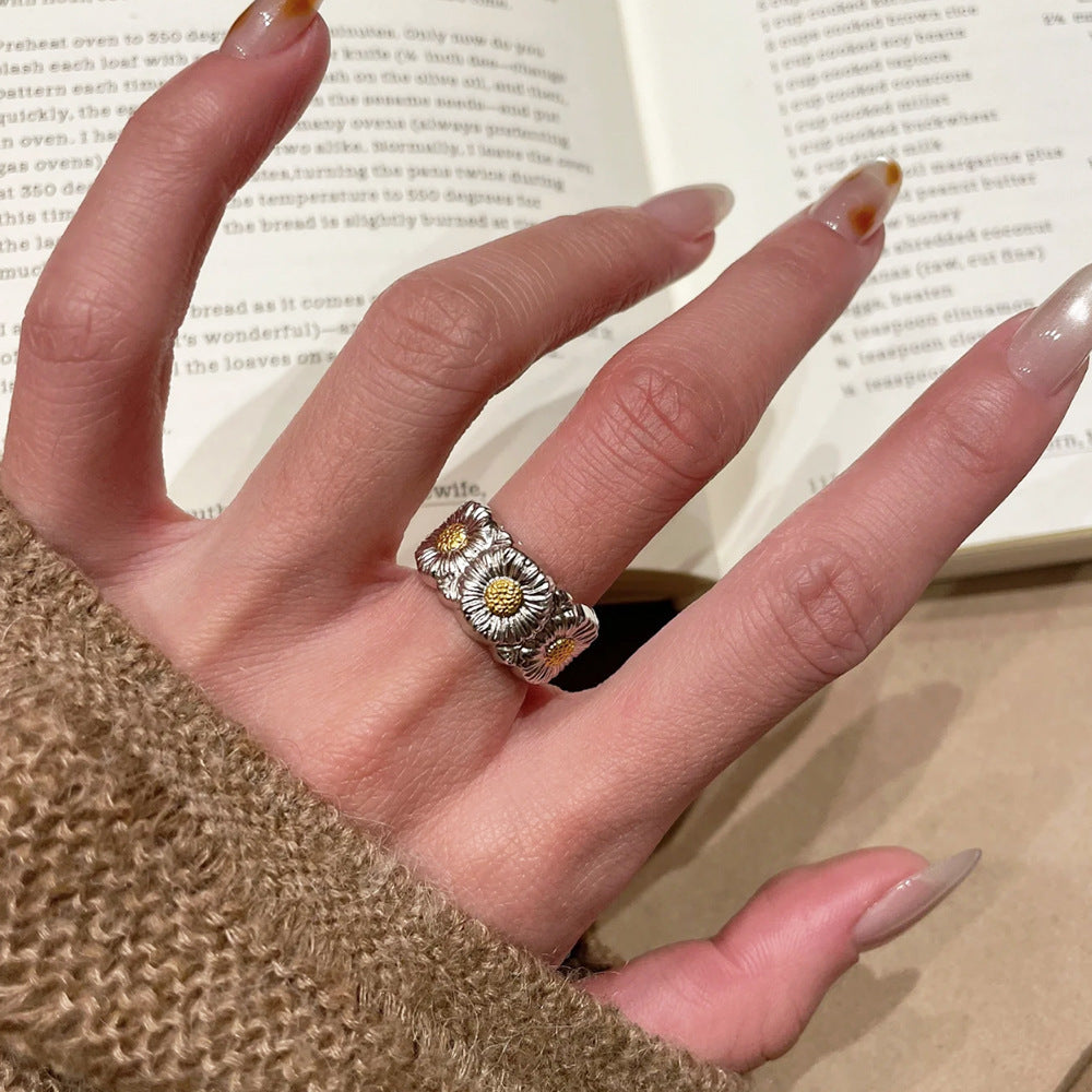 Damenring mit floralen Motiven und kunstvoller Metallbearbeitung Shop Nory