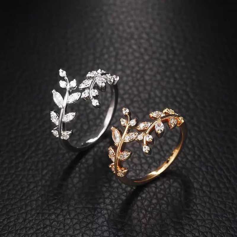 Damenring mit filigranem Blattdesign und funkelnden Zirkonia Shop Nory