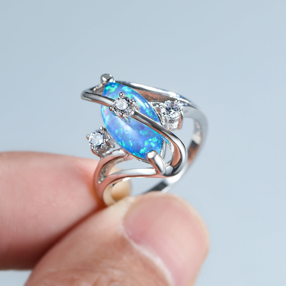 Damen Ring mit funkelndem Opal und eleganten Zirkonia-Details Shop Nory