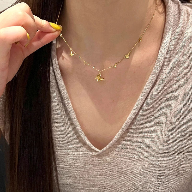 Damen Halskette mit filigranen Schmetterlingsanhängern Shop Nory