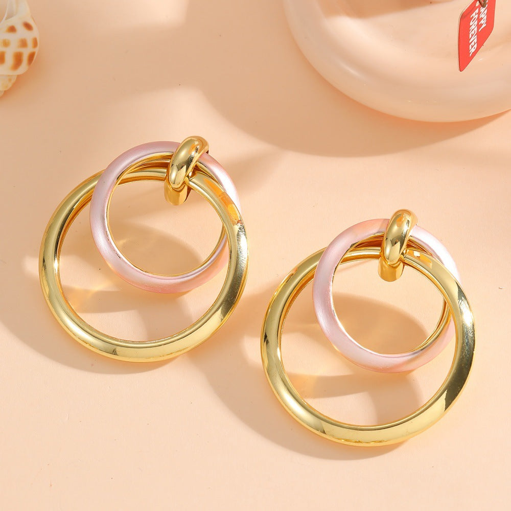 Damen Ohrringe mit elegantem, überlagertem Ringdesign Shop Nory