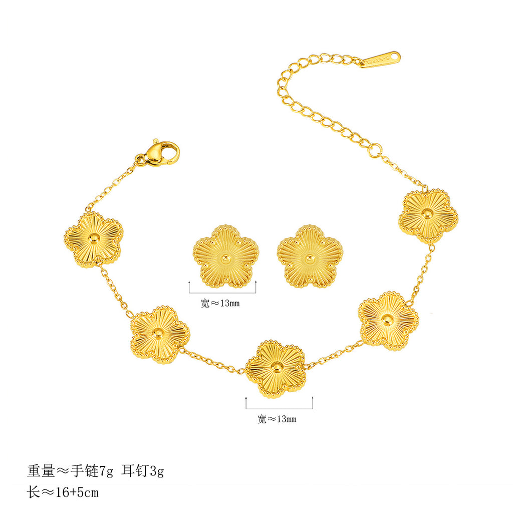 Damen zierliches Blumenarmband mit goldenen Details Shop Nory