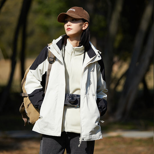 Damen zweilagige wasserabweisende Outdoorjacke mit Kapuze, Taillenregulierung und Kontrastbesätzen Shop Nory