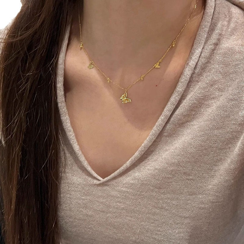 Damen Halskette mit filigranen Schmetterlingsanhängern Shop Nory