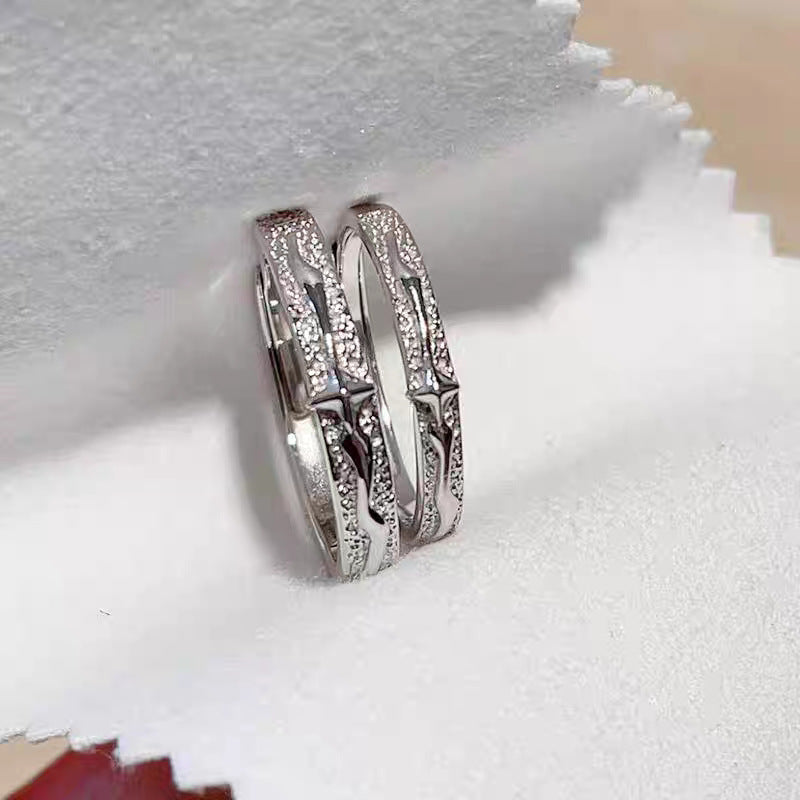 Damenring mit elegantem geschwungenem Design und funkelnden Zirkonia Shop Nory