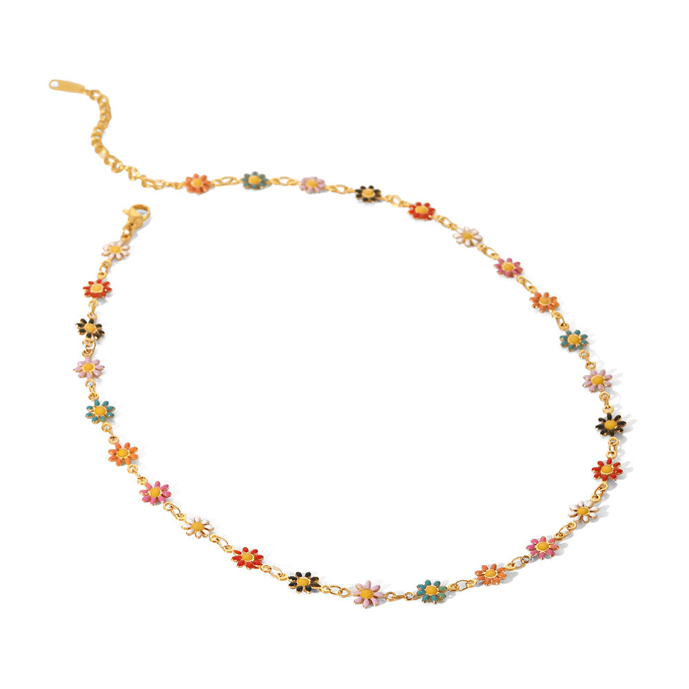 Damen Halskette mit bunten Blumenmotiven und goldfarbener Kettenverarbeitung Shop Nory