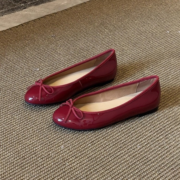 Damen Ballerina-Schuhe mit glänzender Oberfläche und verspieltem Schleifenakzent