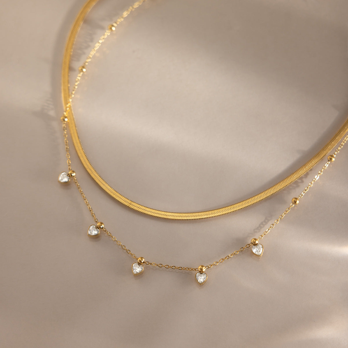 Damen Halskette mit herzförmigen Zirkonia-Anhängern und hochwertiger Edelstahlverarbeitung Shop Nory
