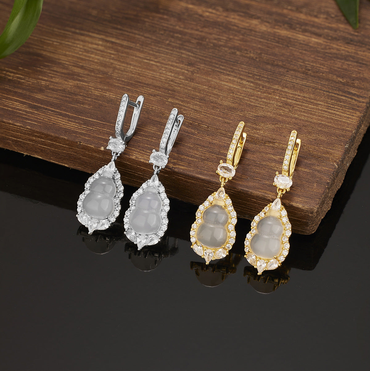 Damen elegante Ohrringe mit kunstvollem Design und funkelnden Zirkonia Shop Nory