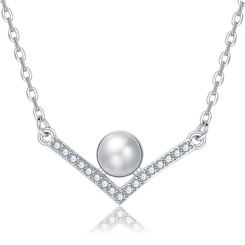 Damen Halskette aus hochwertigem Edelstahl mit eleganter Perle und funkelnden Zirkonia-Elementen Shop Nory