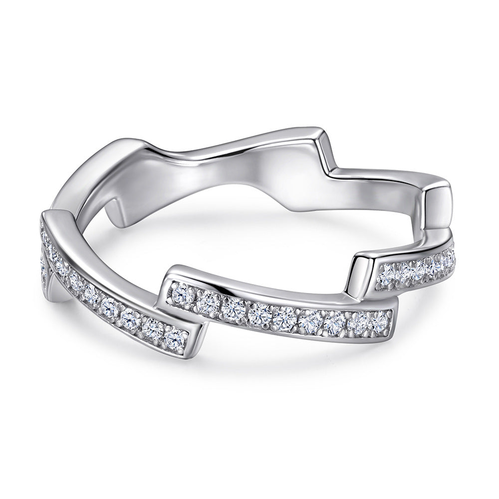 Damen Ring mit geschwungenem Design und funkelnden Zirkonia-Besatz Shop Nory