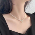 Damen Halskette mit exquisitem Perlenanhänger und filigraner Kettenstruktur Shop Nory