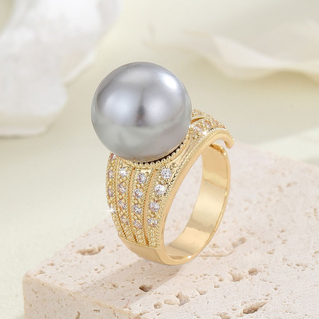 Damenring mit hochwertiger Perle und funkelnden Kristallen Shop Nory
