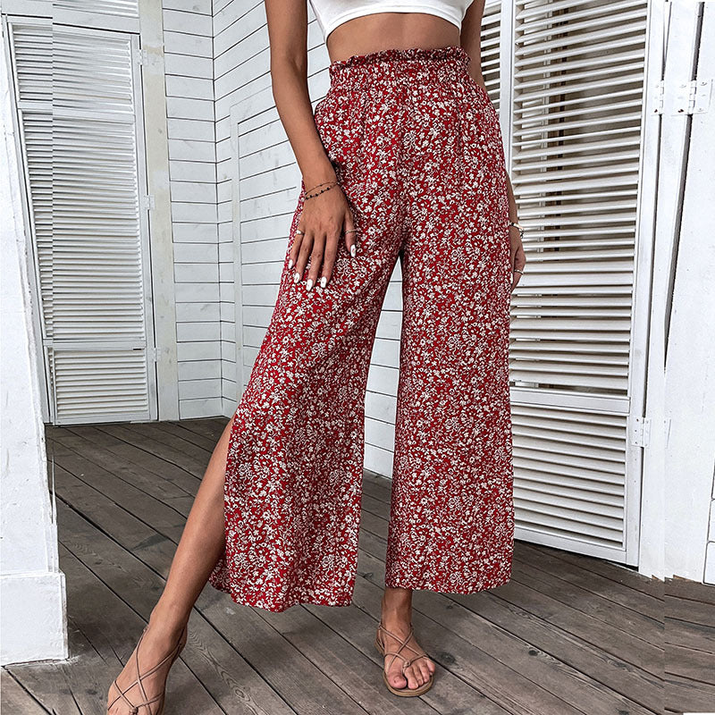 Damen Weite hochgeschnittene Palazzo‑Hose mit floralem Muster und seitlichem Beinschlitz Shop Nory