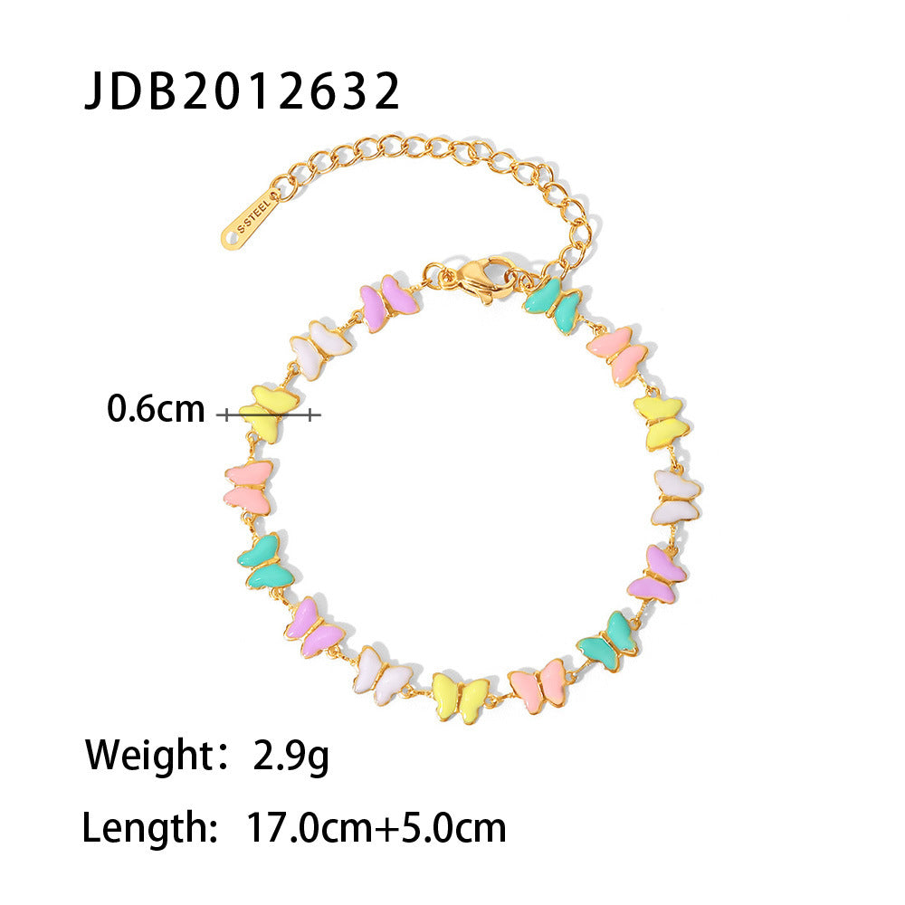 Damen Armband mit bunten Schmetterlingen und hypoallergenem Edelstahl Shop Nory