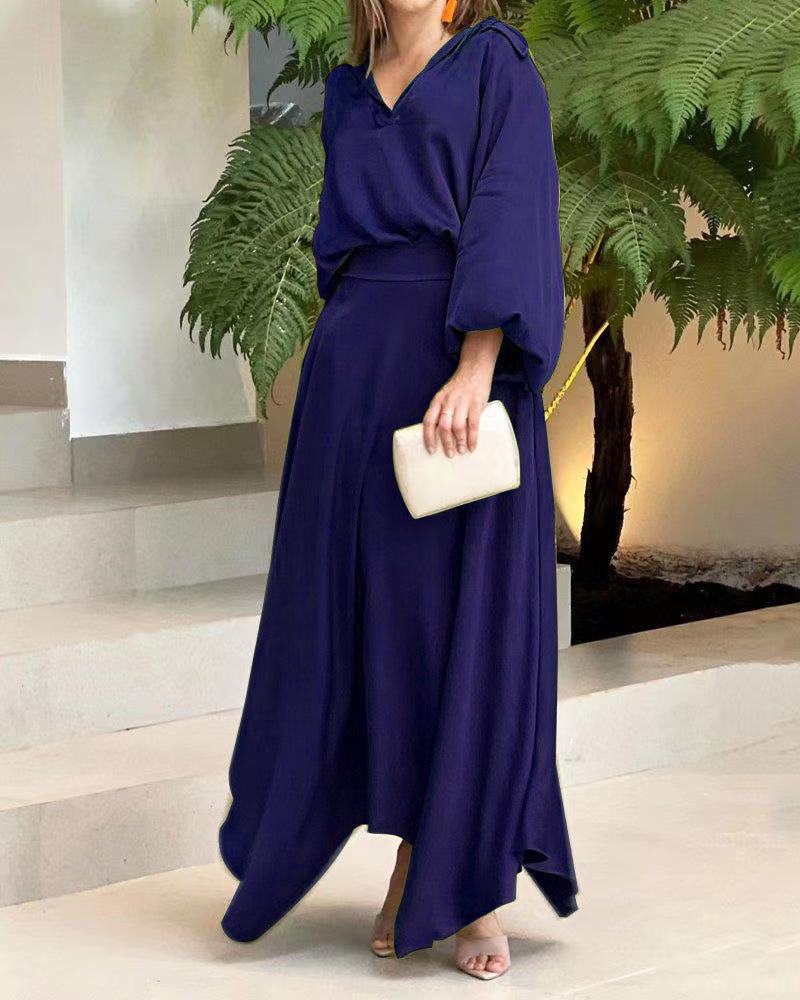 Damen Elegantes Maxikleid mit Kapuzen‑V‑Ausschnitt, Ballonärmeln und fließendem Saum Shop Nory