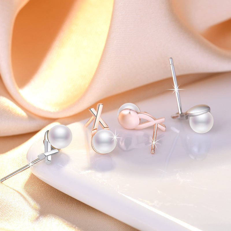 Damen Ohrstecker mit elegantem Perlendesign und modernem Kreuzmotiv Shop Nory
