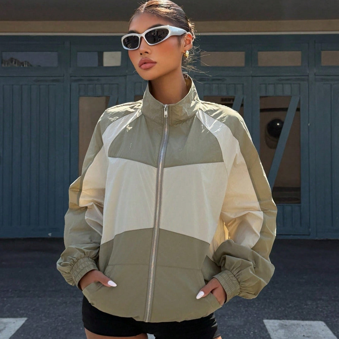 Damen Leichte Windbreaker-Jacke mit Stehkragen, Farbblock-Design und elastischen Bündchen Shop Nory