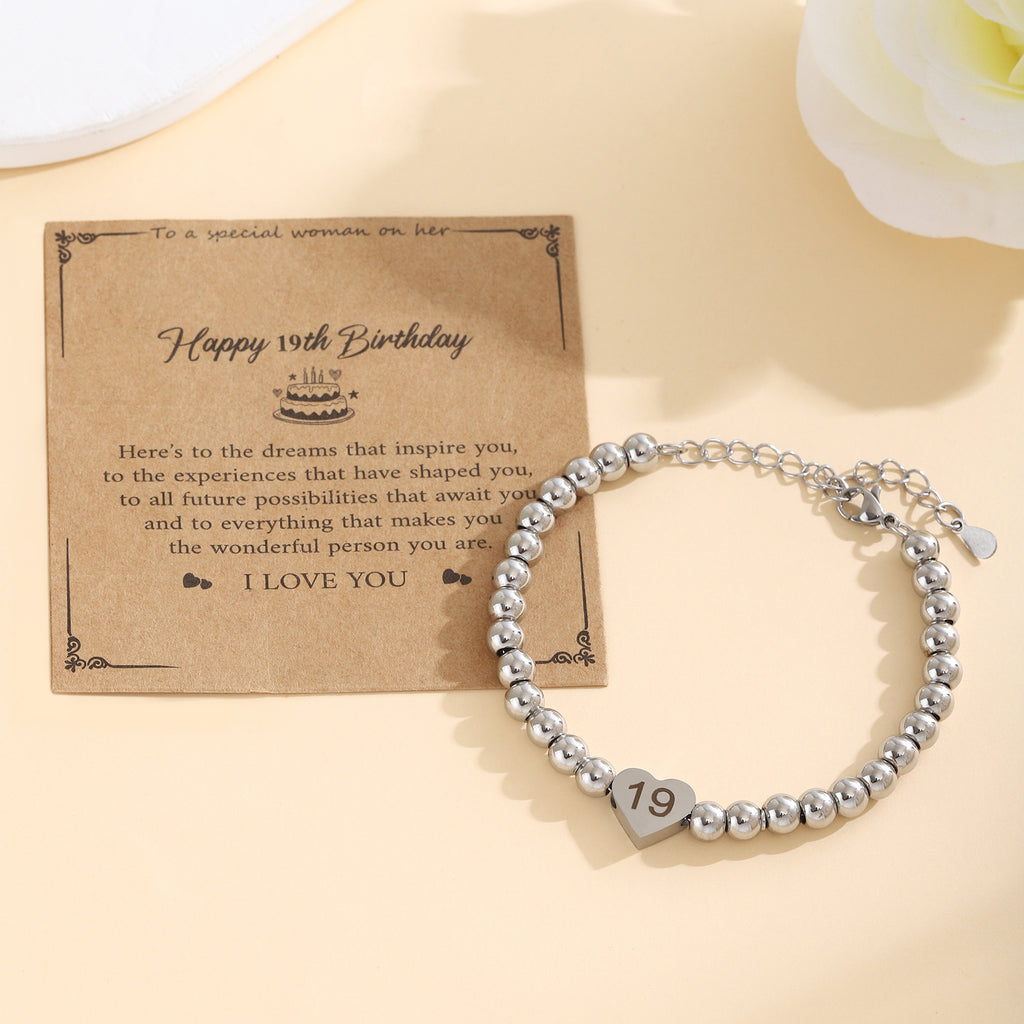 Damenarmband mit Herzanhänger und personalisierbarem Charm Shop Nory
