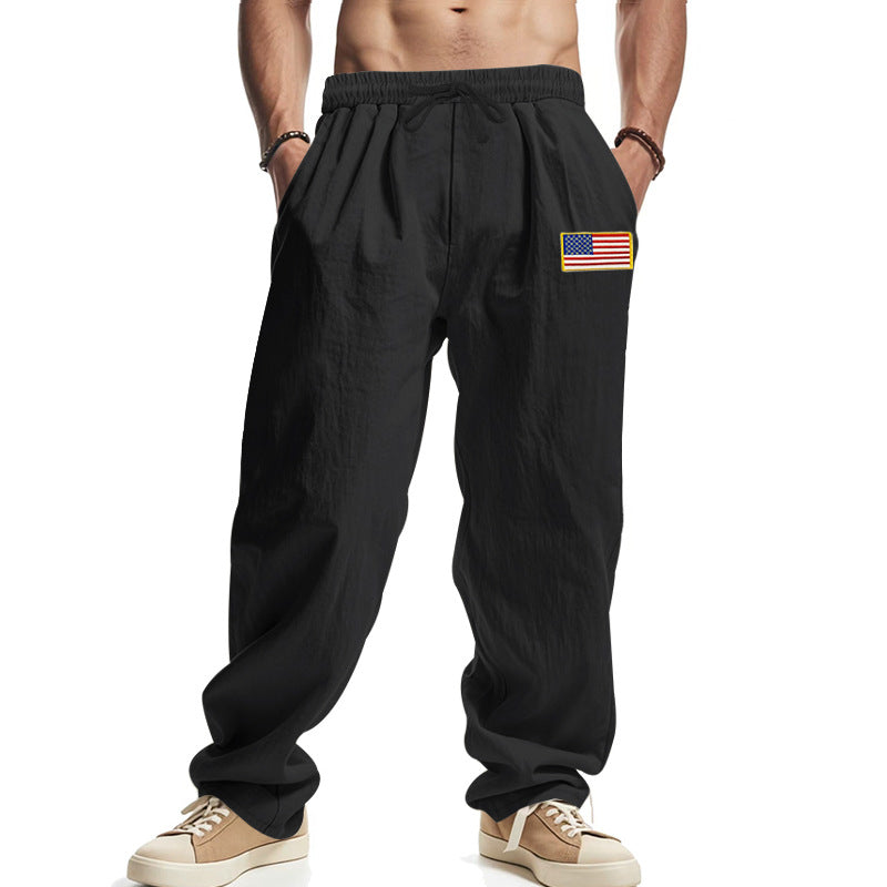 Herren Locker sitzende Freizeit-Hose im Leinen-Look mit elastischem Bund, Kordelzug & Flaggenpatch Shop Nory