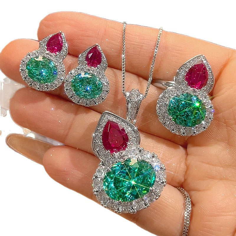 Oval facettierten Mittelstein Tropfen Akzent Halo Anhänger und Ohrringe Set aus Sterlingsilber