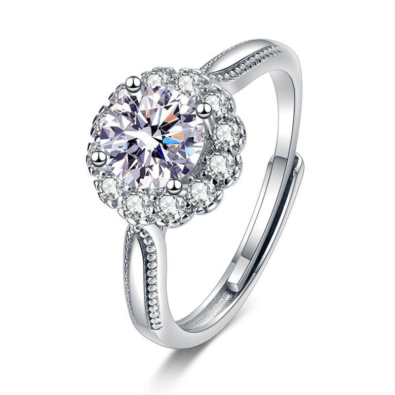 Damen eleganter Ring mit funkelndem Solitär und verspieltem Zirkonia-Besatz Shop Nory